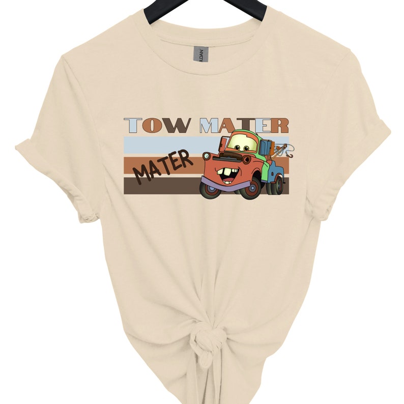 a t - shirt with a tow truck on it