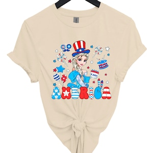 a women's t - shirt with an image of a woman wearing a patriotic