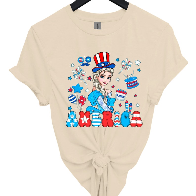 a women's t - shirt with an image of a woman wearing a patriotic