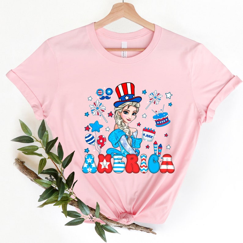 a pink shirt with a picture of a woman in a patriotic hat