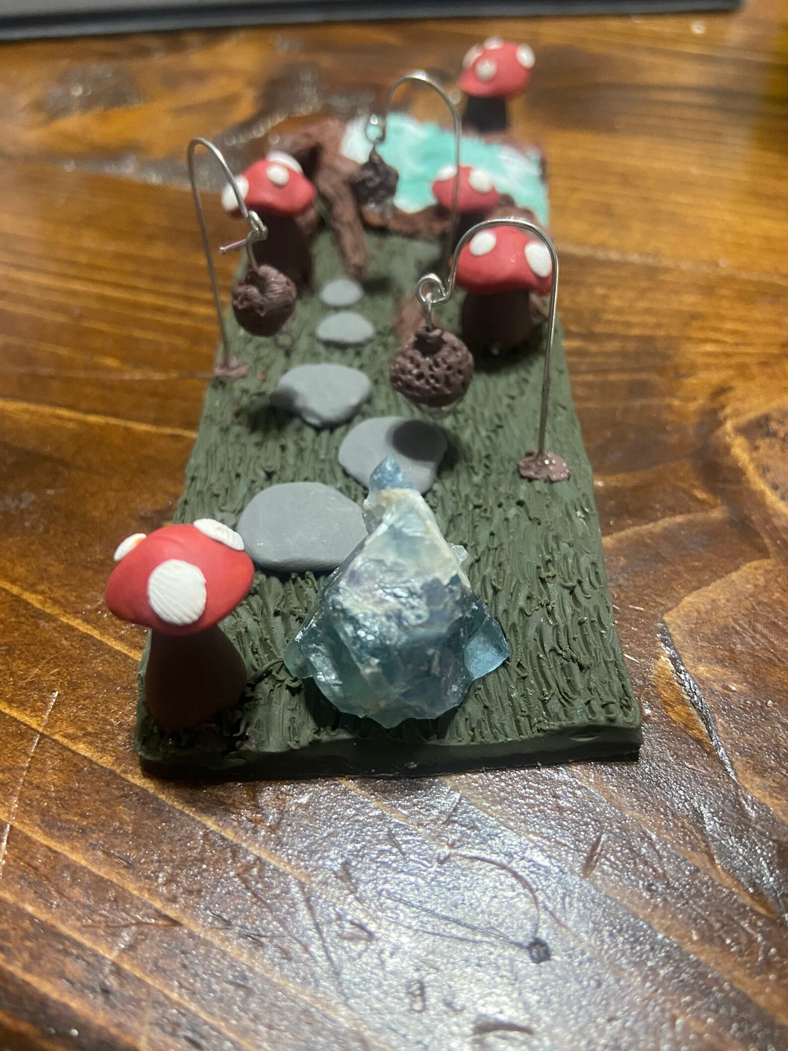 Polymer clay incense holder. Mushrooms and a little River with Etsy