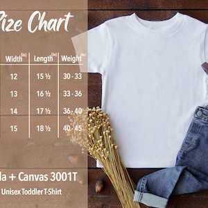 K&ouml;nnte beinhalten: Gr&ouml;&szlig;entabelle f&uuml;r ein Unisex-Kleinkind-T-Shirt mit Angaben zu Breite, L&auml;nge und Gewicht in Zoll. Die Tabelle umfasst die Gr&ouml;&szlig;en 2T, 3T, 4T und 5T. Die Marke ist Bella + Canvas 3001T.