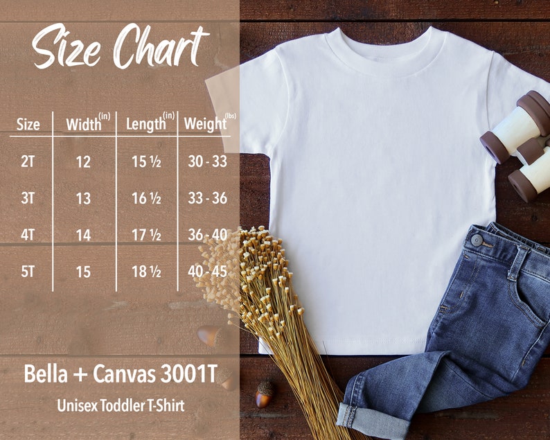 K&ouml;nnte beinhalten: Gr&ouml;&szlig;entabelle f&uuml;r ein Unisex-Kleinkind-T-Shirt mit Angaben zu Breite, L&auml;nge und Gewicht in Zoll. Die Tabelle umfasst die Gr&ouml;&szlig;en 2T, 3T, 4T und 5T. Die Marke ist Bella + Canvas 3001T.