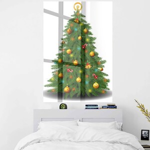 May include: A decorated Christmas tree with gold baubles, red candy canes, and a golden star on top. The tree is in front of a white background.