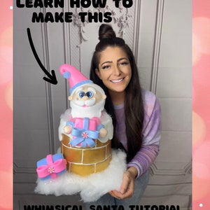 May include: A whimsical Santa Claus figurine in a pink hat and white beard, holding a pink and blue gift box, is emerging from a gold chimney. The figurine is sitting on a white cloud-like base. The text "LEARN HOW TO MAKE THIS" and "WHIMSICAL SANTA TUTORIAL" is visible in the image.
