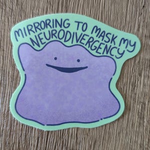 May include: A green and purple sticker with a cartoon character and the text "Mirroring to mask my neurodivergency".
