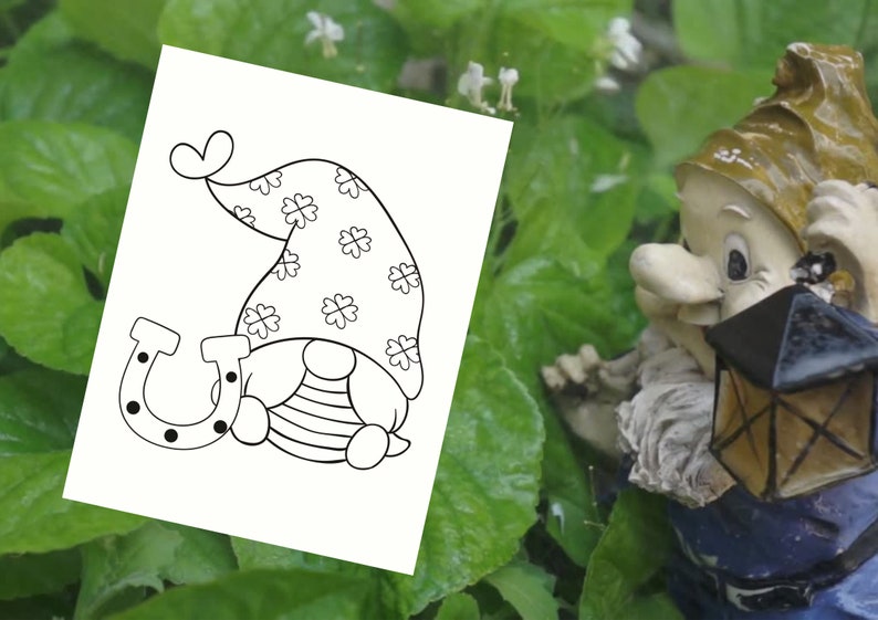 May include: Black and white coloring page featuring a gnome wearing a hat with shamrocks and holding a horseshoe.