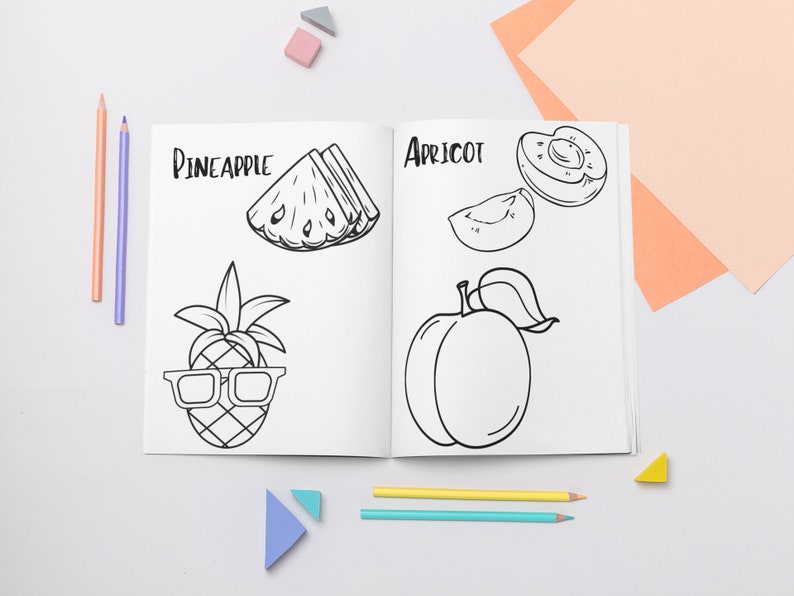 May include: A black and white coloring book with images of a pineapple, apricot, and a pineapple wearing glasses. The words "Pineapple" and "Apricot" are written on the pages.