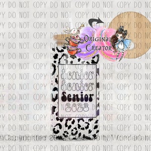 May include: A tumbler with a black and white leopard print design. The tumbler features the text "Senior 2023" in a whimsical font. Decorative elements include illustrations of Alice in Wonderland characters and the words "Original Creator".