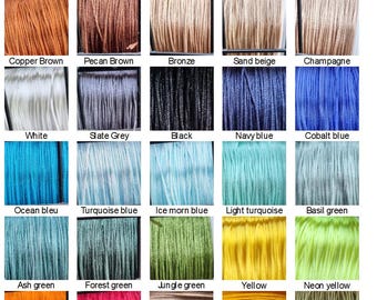 May include: A color chart featuring a variety of cords in a range of colors. The cords are arranged in rows and columns, with each color labeled. Colors include pinks, purples, browns, blues, greens, yellows, oranges, and neutrals.