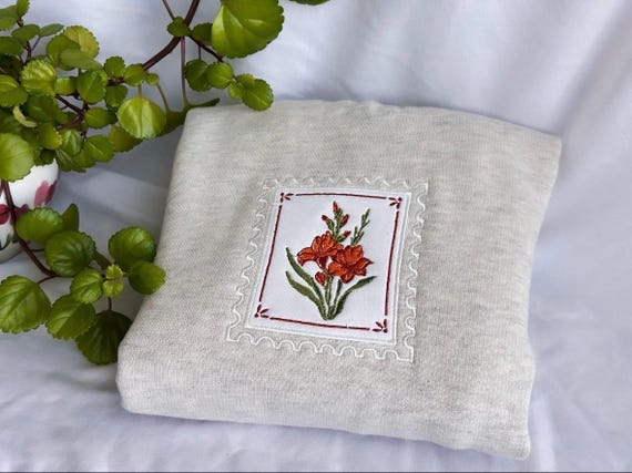 August Birth Flower Stamp Embroidered Sweatshirt - Gladiolus Women's Boxy Fit, Heavyweight Crewneck