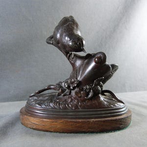 Small Bird Chasing a Ladybug, Patinated Spelter Sculpture in the Style of Paul Comoléra