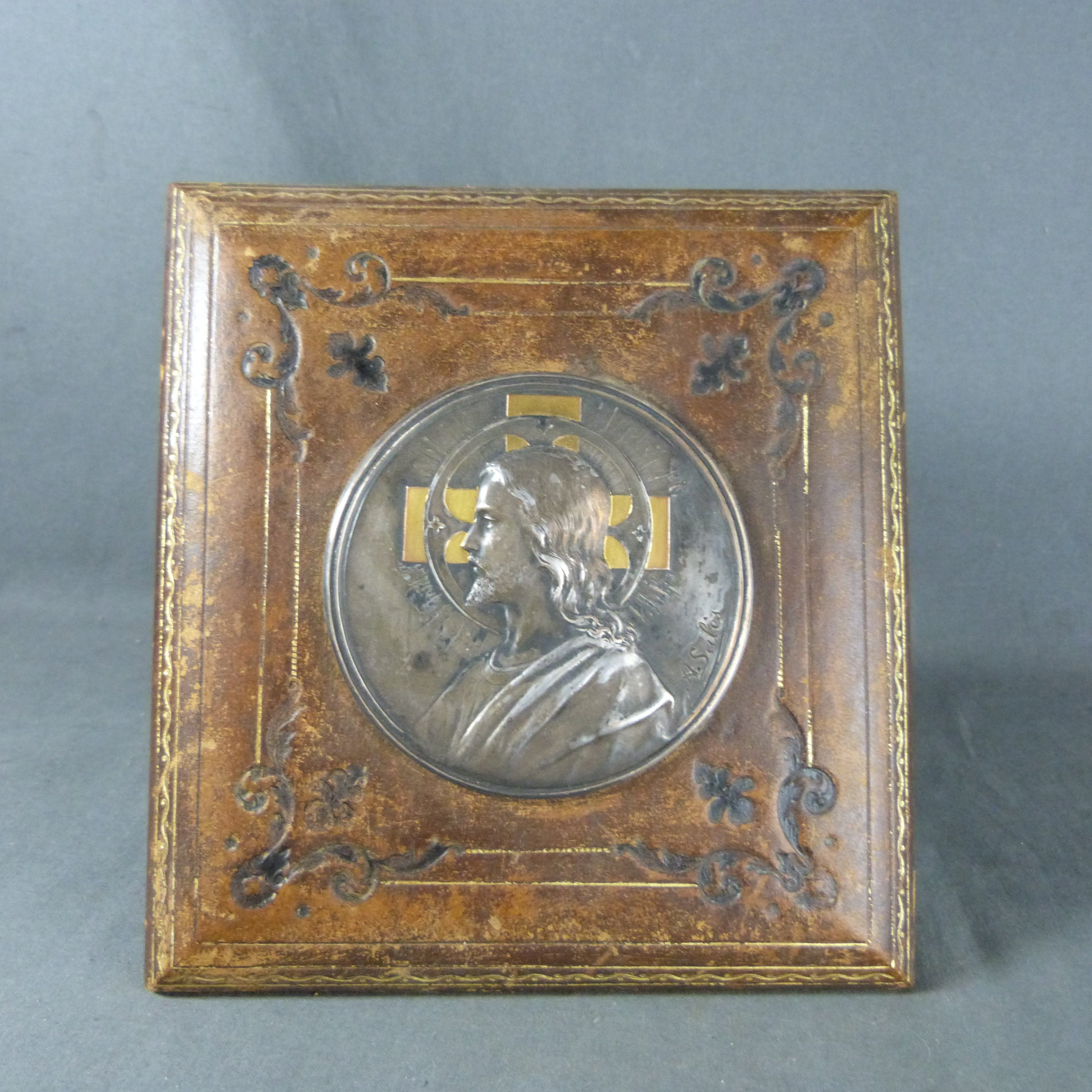 French Antique Signed Tin Plaque Bas Relief Jesus Head On Leather Panel