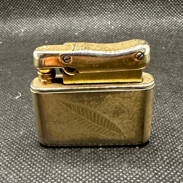 Colibri by Kriesler gold colored short Top Strike Lighter made in West Germany leaf pattern on face/back