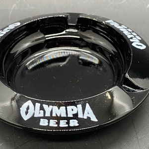 Black Glass Ashtray with Olympia printed on edge