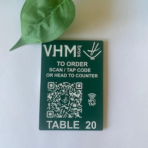 Menu  NFC Tap and QR Code Tabs  - 2 in One... Scan or Tap to download menu.  NFC tap functionality enabled with code