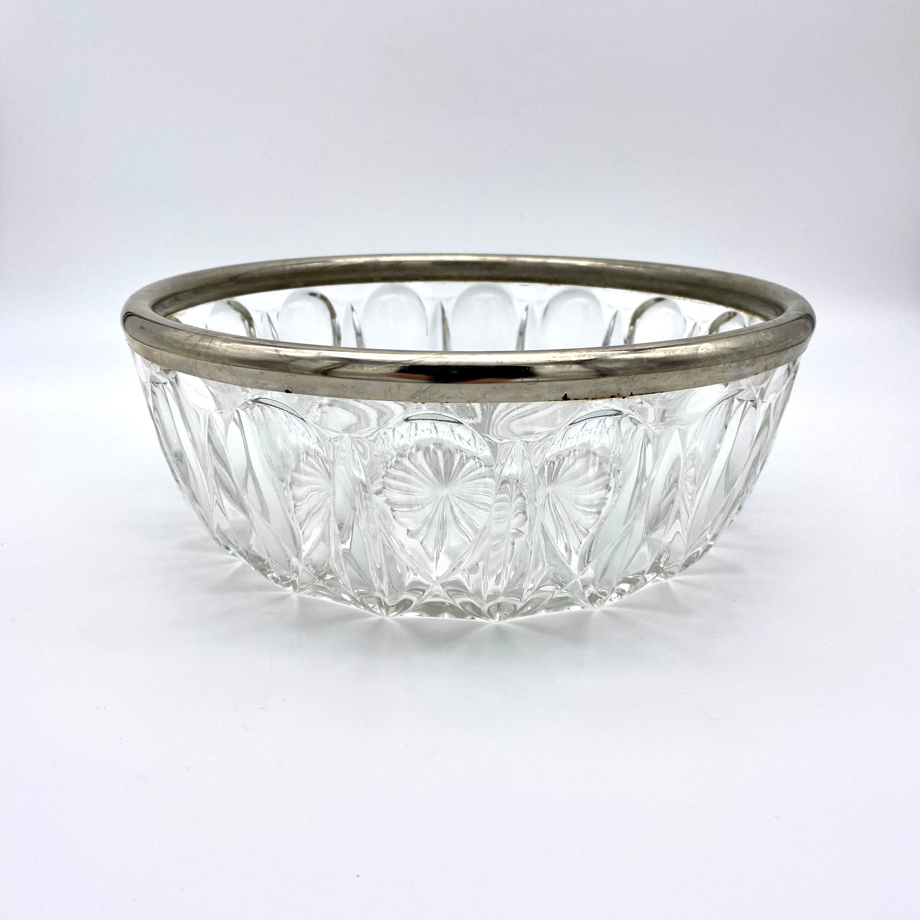 LARGE GLASS SALAD BOWL WITH A METAL RING.