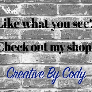 May include: Black and white image of a brick wall with the text "Like what you see? Check out my shop! Creative By Cody" in black and blue lettering.