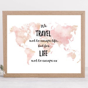 May include: A watercolor world map with the quote "We travel not to escape life, but for life not to escape us." printed on it. The map is in shades of pink and beige.