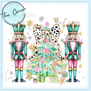 May include: Two nutcracker figurines stand on either side of a green, pink and gold Christmas tree with a black and white polka dot bow. The tree is decorated with gold glitter and pink flowers. The nutcrackers are wearing green and red uniforms with gold accents.