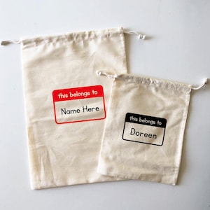 Cela appartient à | Sac à linge en coton naturel avec cordon de serrage pour enfants - Imprimer au Canada