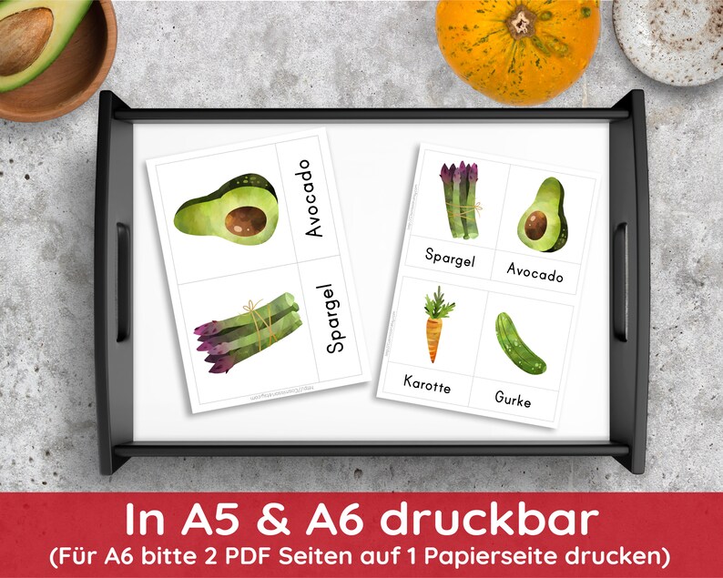 May include: Printable flashcards featuring illustrations of various vegetables, including avocado, asparagus, carrot, and cucumber. The cards are labeled in German with the names of the vegetables.