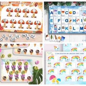May include: Four colorful alphabet learning cards with different themes: autumn leaves, winter, ice cream, and rainbows. Each card features a grid of letters and images to match.