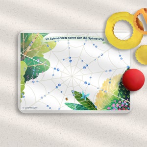 May include: A colorful learning game with a spider web design, featuring a bee, a butterfly, and blue beads. The game includes a red ball, a yellow ring, and a yellow circle.