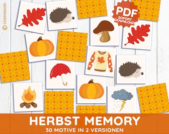 May include: A collection of illustrated cards with autumn-themed images, including pumpkins, leaves, hedgehogs, and a sweater. The cards are arranged on a white wooden surface, with the text "HERBST MEMORY" and "PDF SOFORT DOWNLOAD" visible.