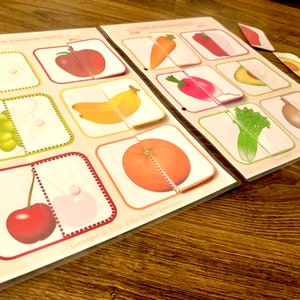 May include: Two sets of flashcards with pictures of fruits and vegetables cut in half. The cards are labeled "Find the matching half" and "Find the other half".
