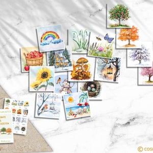 May include: A set of 12 watercolor illustrations depicting the months of the year and the four seasons. The illustrations include a rainbow, a snowman, a birdhouse, a nest with eggs, a sunflower, a mushroom, a lantern, a tree with apples, a tree with leaves, a tree with blossoms, a tree with snow, and a beach scene.