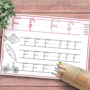 May include: A printable worksheet for practicing writing the letter F. The worksheet includes a dotted line guide for tracing the letter, as well as a section for drawing the letter independently. The worksheet also includes a fish, a feather, and a bicycle.