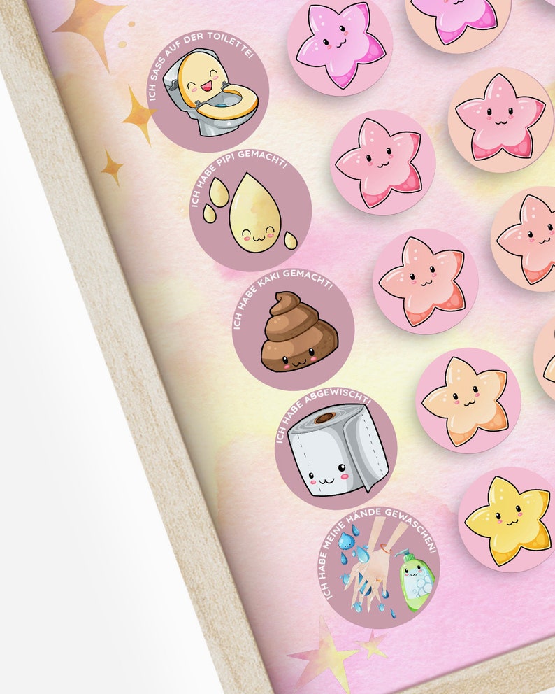 May include: A set of 10 colorful, round stickers with cartoon characters and German phrases. The stickers feature a toilet, a drop of pee, a pile of poop, a roll of toilet paper, and hands washing with soap. Each sticker has a pink background with a white border and a cute cartoon character.
