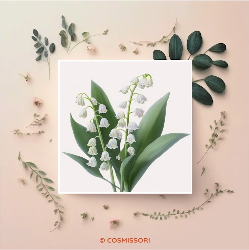 K&ouml;nnte beinhalten: Eine wei&szlig;e Karte mit einer botanischen Illustration von Maigl&ouml;ckchen-Bl&uuml;ten mit gr&uuml;nen Bl&auml;ttern. Die Karte ist umgeben von kleinen gr&uuml;nen Bl&auml;ttern und Bl&uuml;ten auf einem hellrosa Hintergrund.