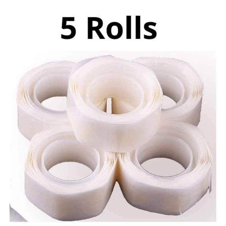 May include: Five rolls of white double-sided adhesive tape.