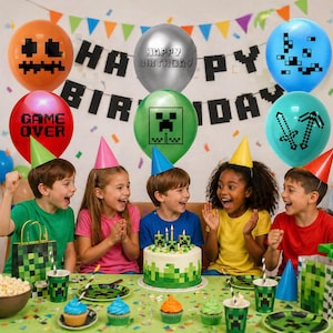 May include: A birthday party scene with children and decorations. Balloons with pixelated designs and the words "Happy Birthday" and "Game Over" are visible. A cake with candles and pixelated decorations sits on a table with cupcakes and party supplies.