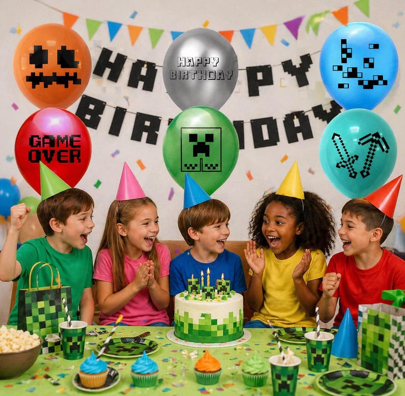 May include: A birthday party scene with children and decorations. Balloons with pixelated designs and the words "Happy Birthday" and "Game Over" are visible. A cake with candles and pixelated decorations sits on a table with cupcakes and party supplies.