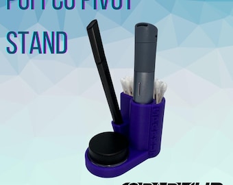 May include: Purple plastic stand for a Puffco Pivot vaporizer. The stand has two slots for the vaporizer and a small compartment for cotton swabs. The stand is labeled "SPARKUP" on the bottom.