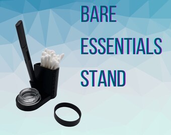 May include: Black plastic stand with a small glass jar, a cotton swab holder, and a black pen. The stand is labeled "BARE ESSENTIALS STAND" and "SPARKUP".