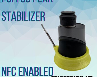 May include: A yellow 3D printed stabilizer for a Puffco Peak vaporizer. The stabilizer is designed to prevent the vaporizer from tipping over. The stabilizer is NFC enabled and has the word "SPARKUP" printed on it.