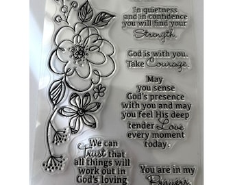 May include: Clear stamp set with floral and inspirational text designs. Includes phrases like "A Special Prayer for You," "God is with you," and "You are in my Prayers." The set features a large flower and leaf design.