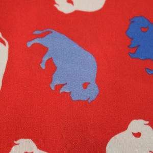 Buffalo NY - White and Blue tossed BUFFALOS on RED, Buffalo bills
