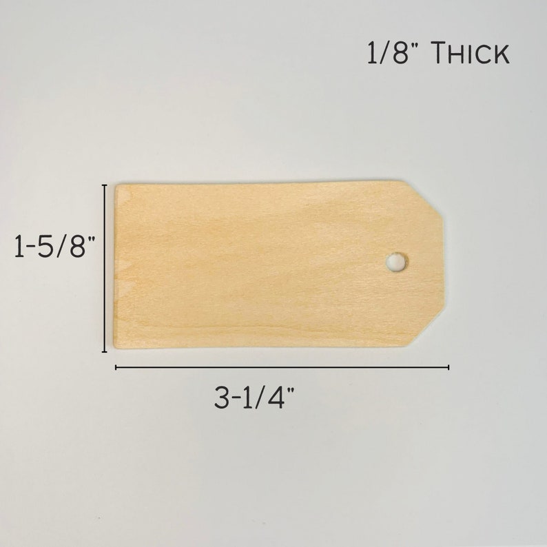 May include: A natural wood tag with a hole in the top. The tag is 3-1/4 inches wide and 1-5/8 inches tall. It is 1/8 inch thick.