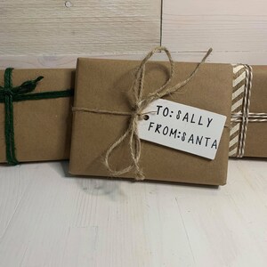 Additional example of blank wood tags for gift - decorated for Christmas present.