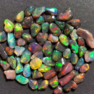 100 PCS AAA + QUALITY Ethiopian Opal Black Colour Polished Rough Natural Gemstone Electric Fire Top Quality Opal Polished Rough