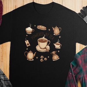 Powered By Tea T Shirt, Tea Lover Gift, Cute Teapot Design, Tea Addict Shirt, Tea Party Outfit, Relax Drink, Hot Beverage, Tea Cup Tees