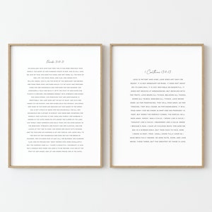 May include: Two framed prints with white backgrounds and black text. The left print features the Bible verse Philippians 4:8. The right print features the Bible verse 1 Corinthians 13:4-13.