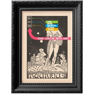 May include: Black framed print featuring a vintage illustration of a man holding a basket. The illustration is in black and white and features a stylised background with plants and stars. The text "Aquarius" is at the bottom of the print. The text "YOUR CUSTOM BIRTH DATE" is in pink at the top of the print.
