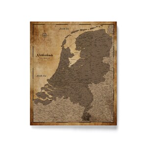 May include: A vintage-style map of the Netherlands with a brown background and white text. The map shows the provinces of the Netherlands and the North Sea. The map is titled "Netherlands Travel Adventures".