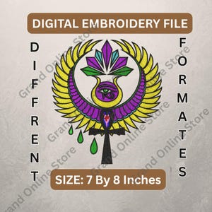 May include: Digital embroidery file featuring a colorful Egyptian design with an eye, wings, and an ankh symbol. The design is in yellow, purple, green, and blue. The size is 7 by 8 inches.